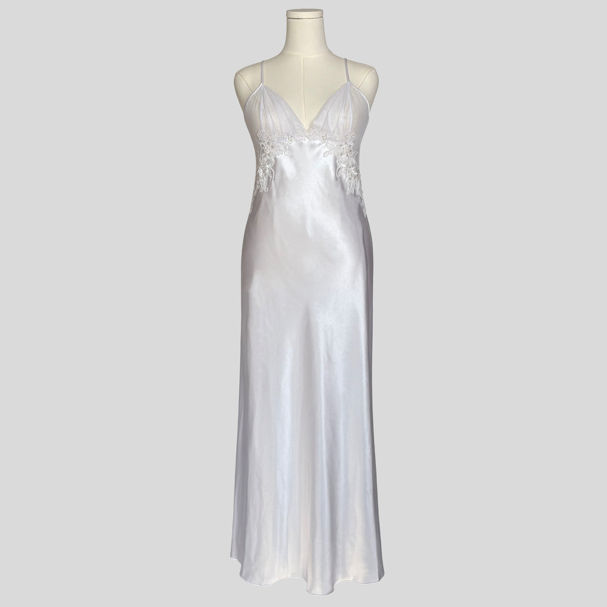 Backless floral appliqué bridal gown