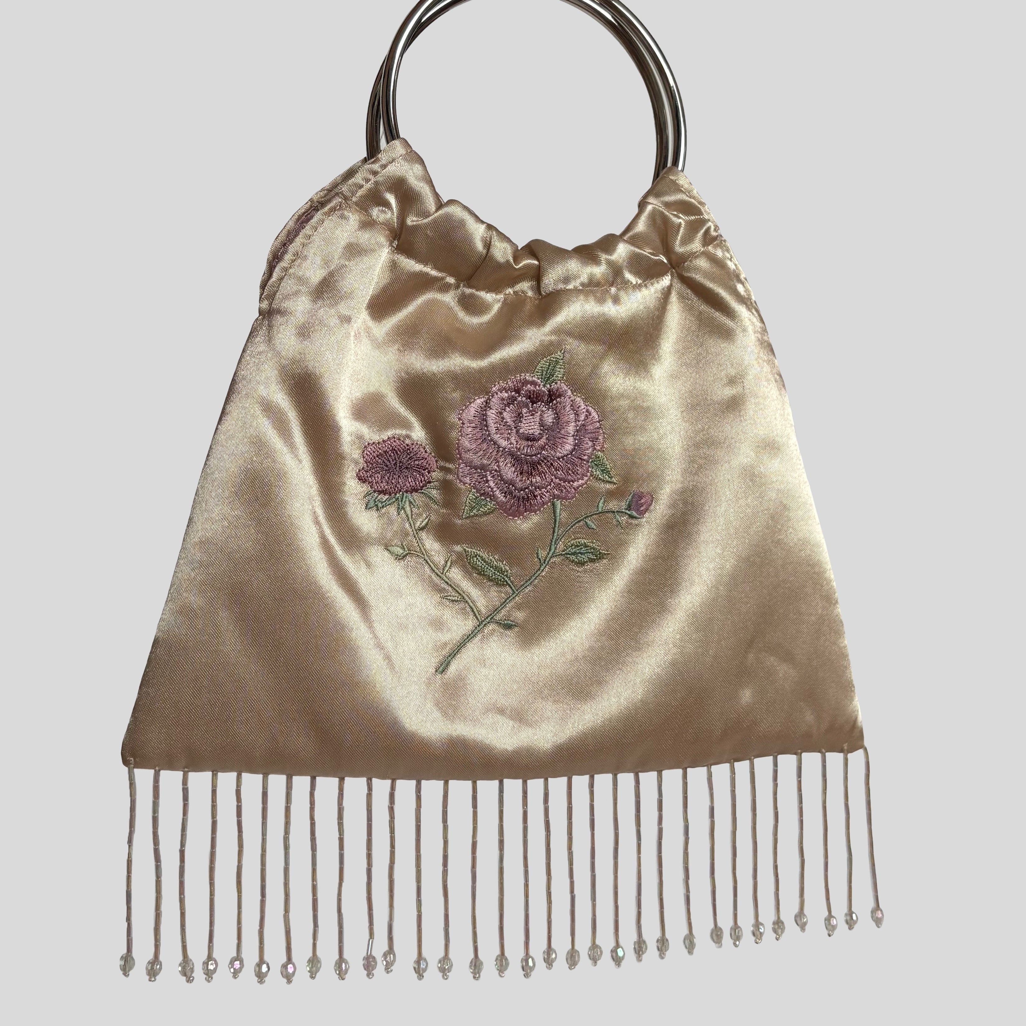 Floral embroidered fringe trim purse in tan