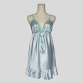 Silky polka dot ruffled slip