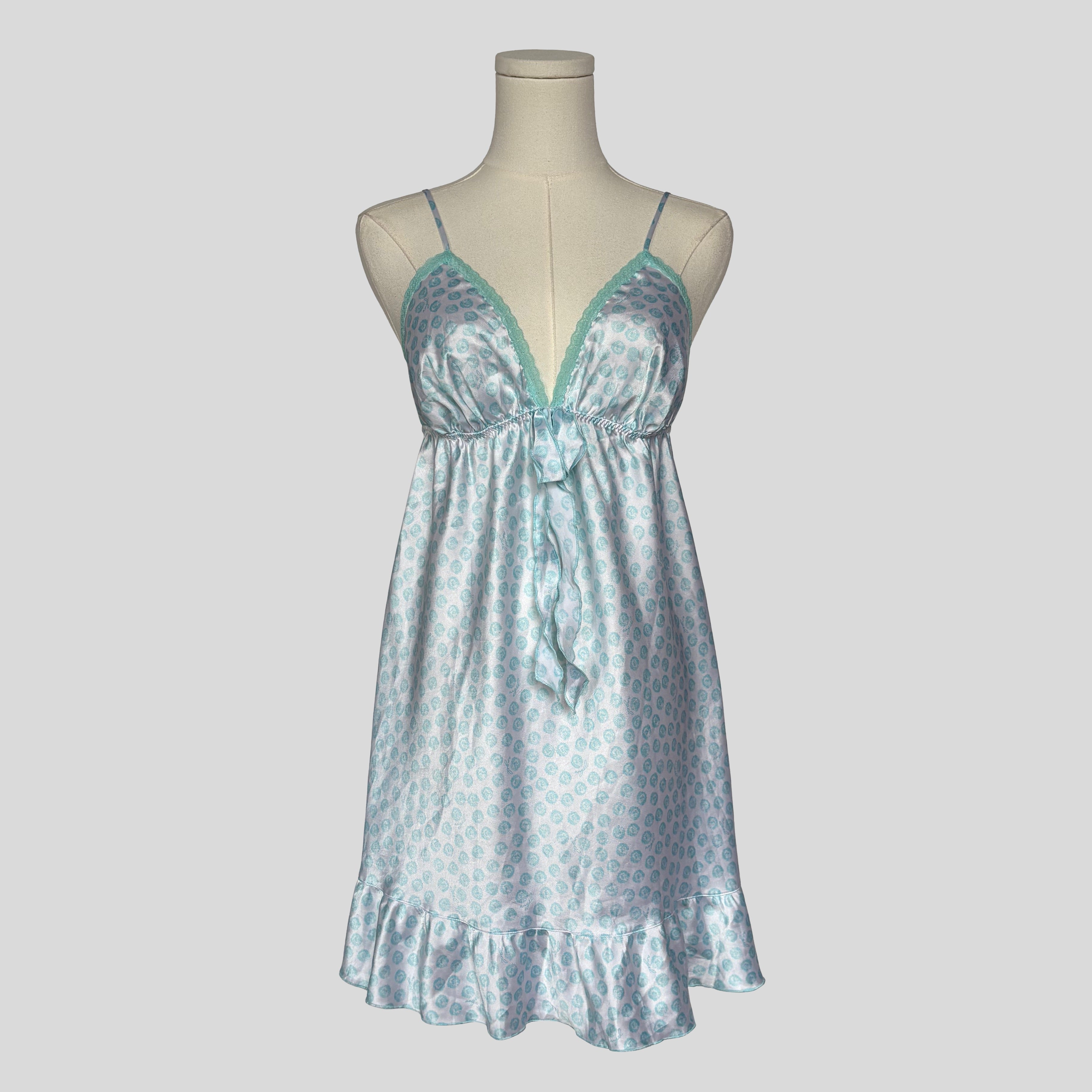 Silky polka dot ruffled slip