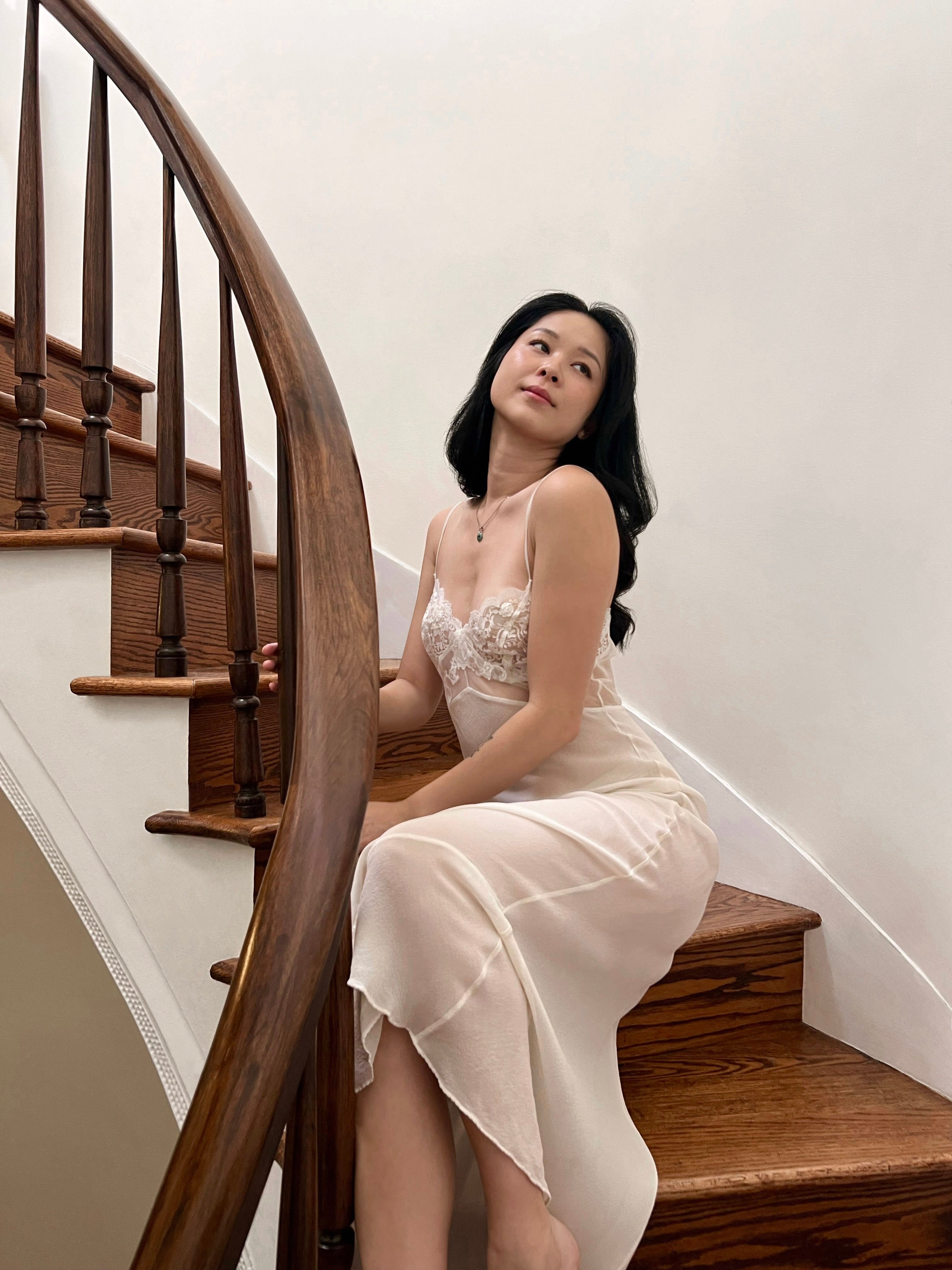 Delicate sheer lace gown in white