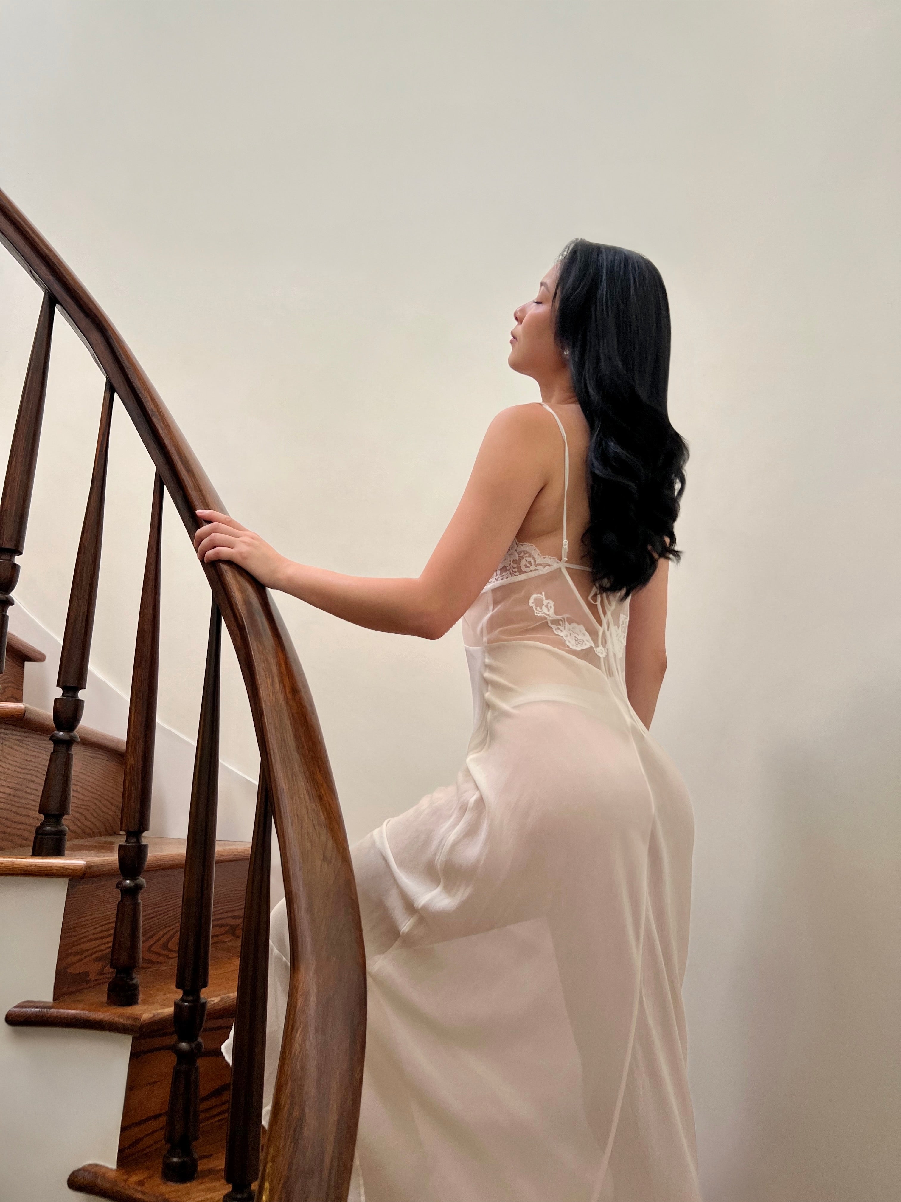 Delicate sheer lace gown in white