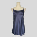 Silk slip dress with side cutouts and bows in navy