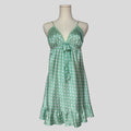 Silky polka dot ruffled slip in teal and white