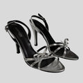 Silver stiletto slingback heels - size 7.5