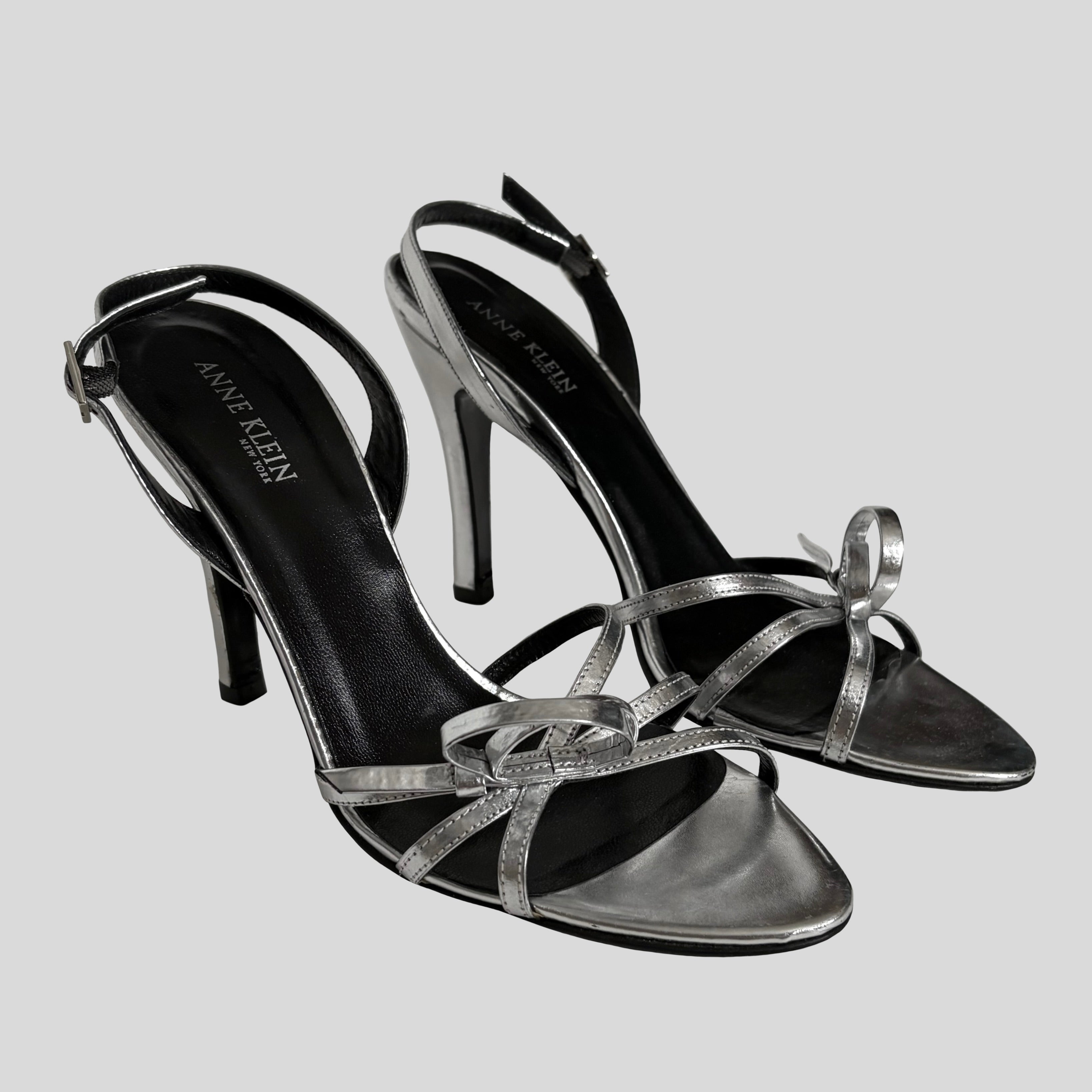Silver stiletto slingback heels - size 7.5
